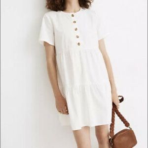 New with tags, Madewell white babydoll dress with tortoise buttons.